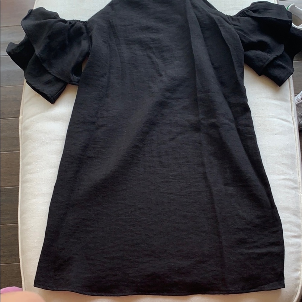 Black dress with ruffle sleeves